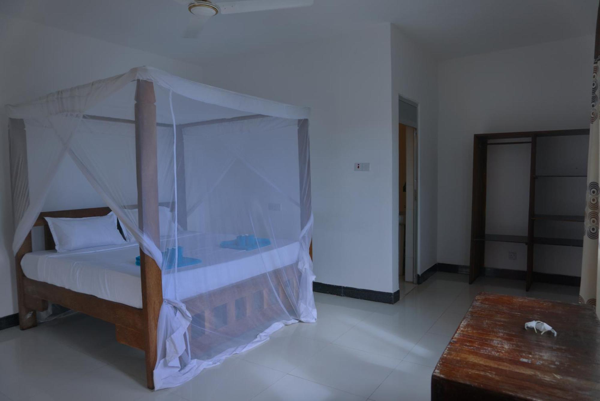 Cocolala Beach House Nungwi Quarto foto